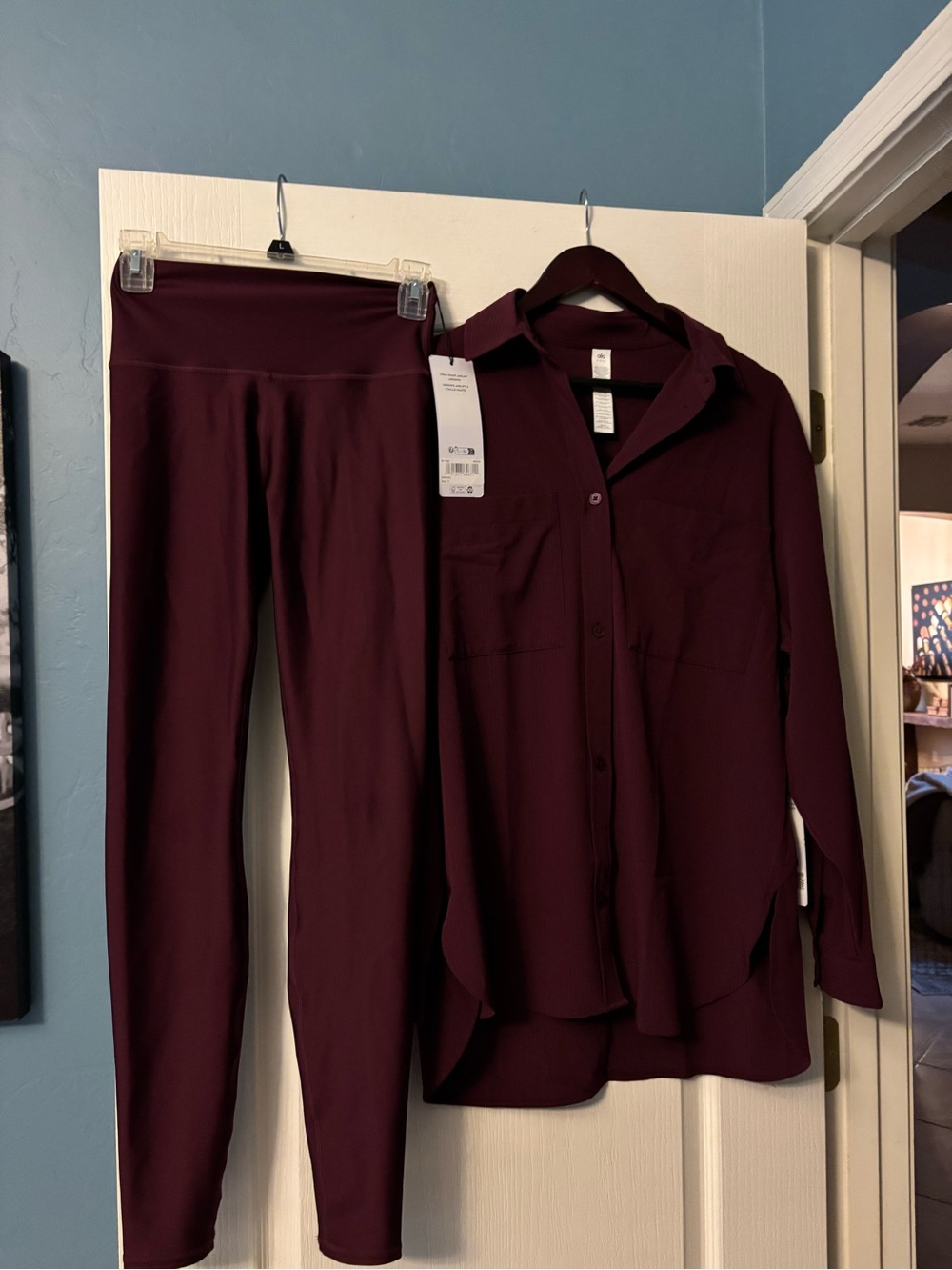ALO Yoga Deep Wine Button-Up Top and high waist airlift leggings.